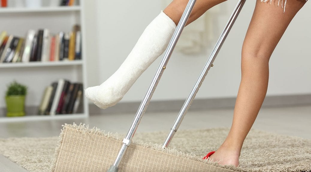 Close up of a disabled girl legs stumbling with a carpet at home; blog: 10 Ways to Prevent Falls and Fractures